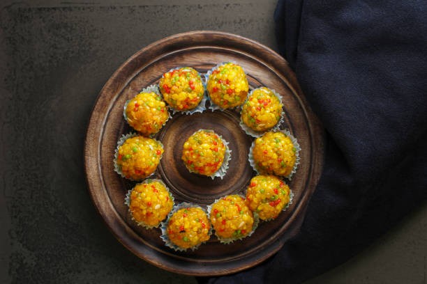 Indian sweet Laddu Laddu also know as laddoo, ladoo, laddo are ball-shaped sweets popular in the Indian festivals. Laddu are made of flour, minced dough and sugar with other ingredients. india sweets stock pictures, royalty-free photos & images