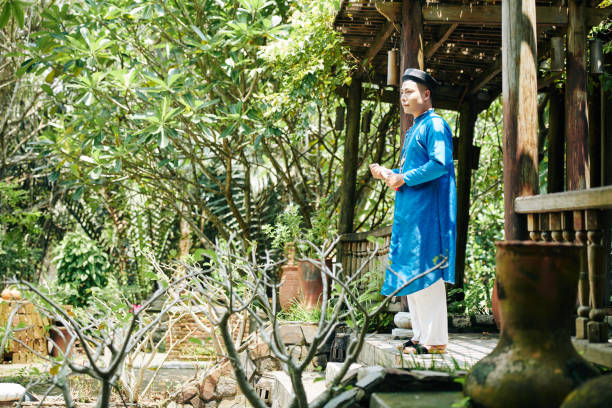 istock Man Looking at Beautiful Garden 1338730981