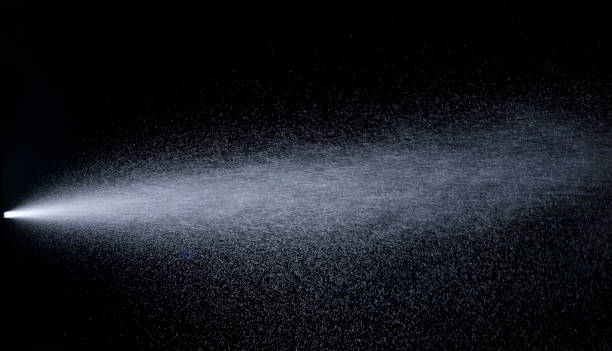 istock Water jet spraying on black background 1338733494