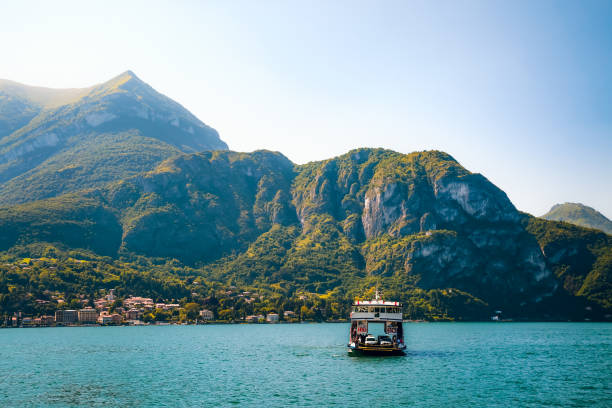 istock Ferry boat against Italian Alps 1338736373