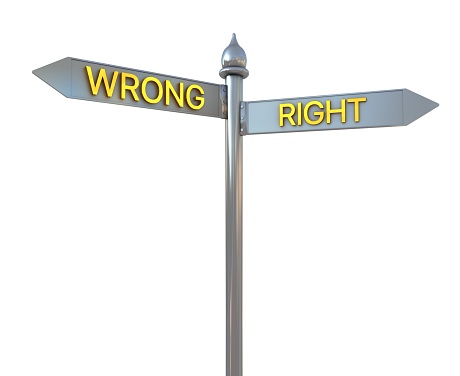Street signs pointing opposite directions: Wrong or Right