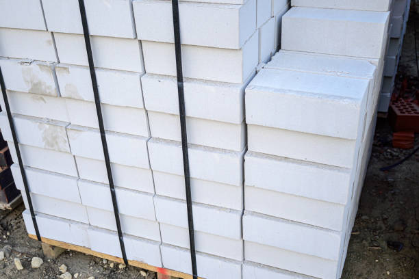 istock White silicate brick on pallets in a warehouse 1338739226