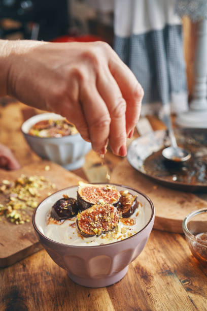 istock Healthy Yogurt with Caramelized Figs, Honey and Pistachio 1338739415