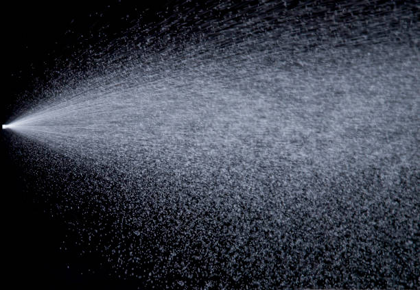 istock Water jet spraying on black background 1338739416