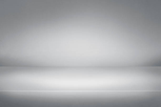 istock Gray abstract cement wall background and studio room, interior texture for display products. 1338740711