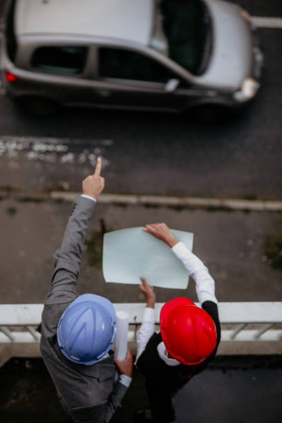 istock Top view of engineers wearing a hardhats 1338740933