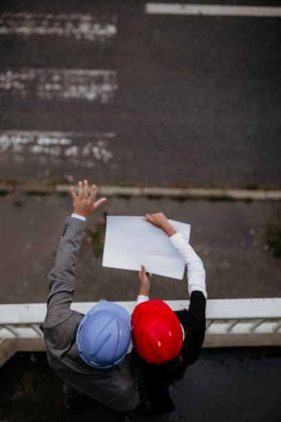 istock Top view of engineers wearing a hardhats 1338740975