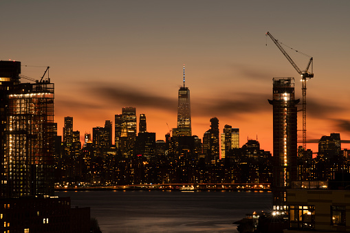 View towards downtown Manhattan at dusk in New York City.