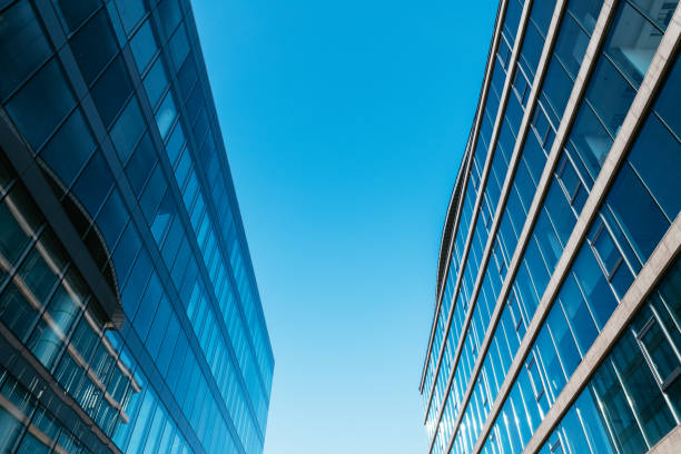 istock Office building exterior in financial district, low angle view 1338744321