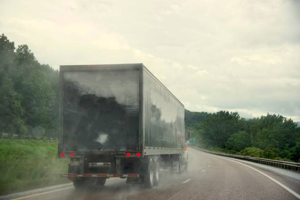 istock Semi Passing on Rainy Morning 1338746663