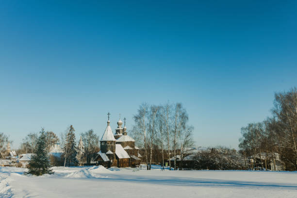 istock an old house in a field in winter 1338747101