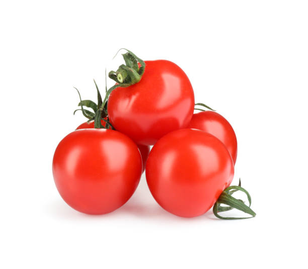 istock Fresh ripe organic tomatoes isolated on white 1338748573