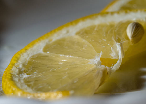istock a slice of lemon with a stone 1338749697