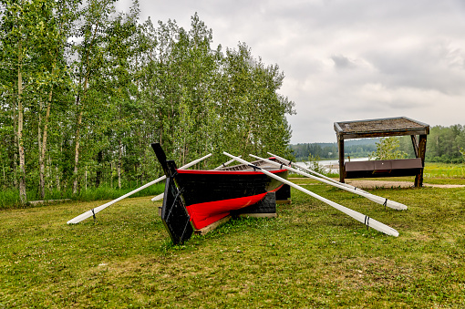 Rocky Mountain House, Alberta - July 21, 2021: Dorry boat on display in a field at Rocky Mountain House Alberta