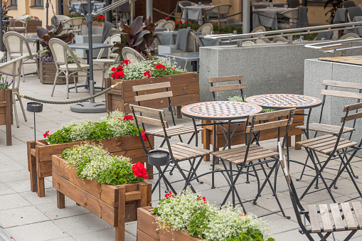 Beautiful view of outdoor cafe on bright summer day. Sweden.