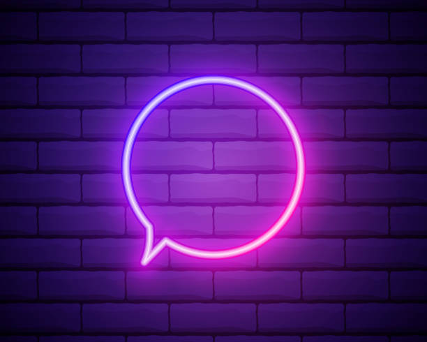 istock Speech bubble pink glowing neon ui ux icon. Glowing sign logo vector . Glowing speech bubble isolated on brick wall background . 1338757096