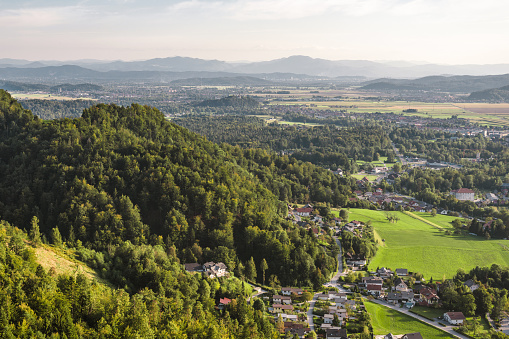 Aerial view on a small town Kamnik Slovenia. Woods and meadows