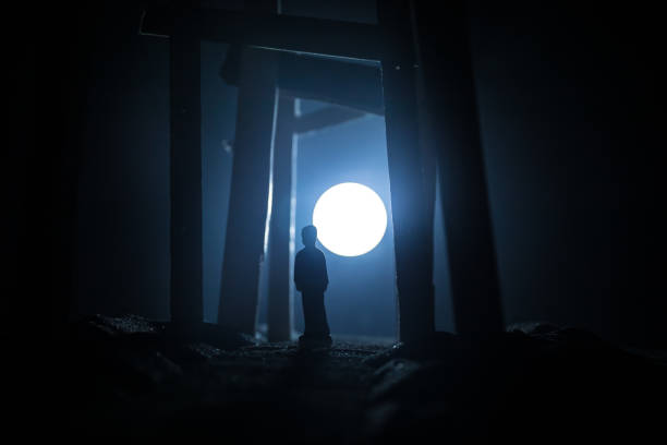 istock Creative artwork decoration. Abstract Japanese style wooden tunnel at night. Selective focus 1338761547