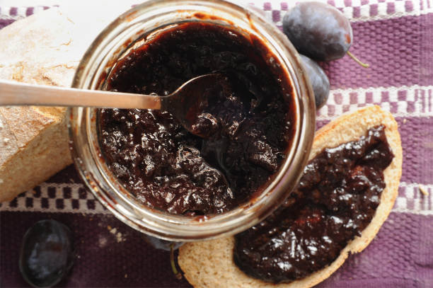 istock Serbian plum jam spread on a piece of a bannock bread 1338763067