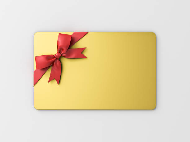 istock Gold gift card with red ribbon bow isolated on white grey background with shadow minimal concept 1338763086