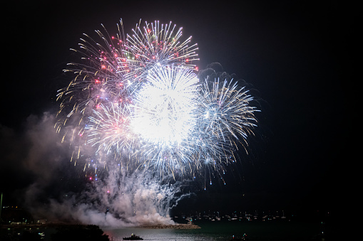 Plymouth, UK. Wednesday 18 August 2021. Fireworks over Plymouth Harbour with boats