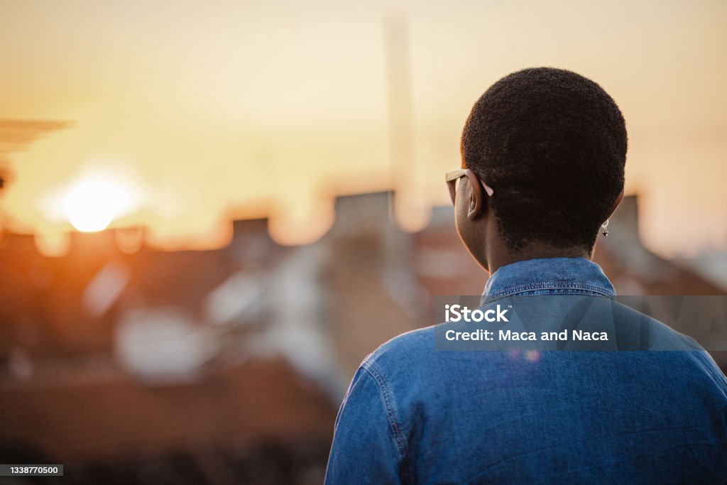 Thinking and contemplation Rear view of a young confident African-American woman looking at the view Anticipation Stock Photo