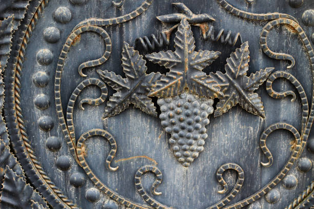 Classic historic old vintage metal pattern for the gates of the southern countries of Europe in the form of grapes.