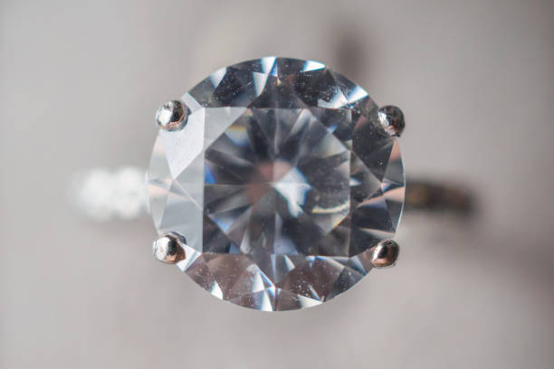 istock Diamond ring in jewelry gift box close up background 1338777184