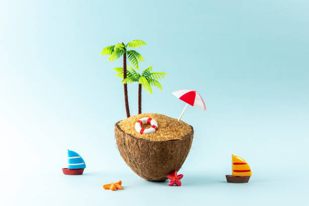 istock Creative beach concept made of coconut fruit, palm tree and summer stuff . Minimal summer background. 1338780943