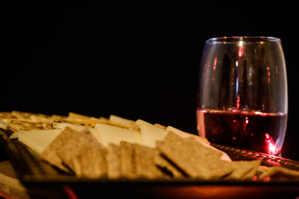 istock Cheese and Cracker Board With Wine In A Glass 1338782033