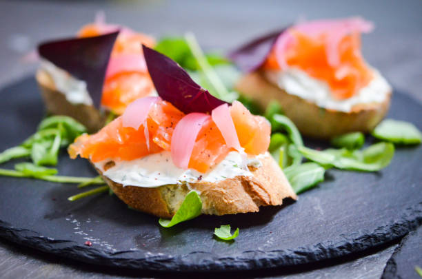 istock mix bruschetta with fresh vegetables, goat cheese & grapes 1338782664