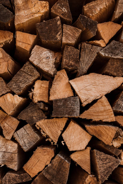istock Firewood catted and stacked in rows, wooden bacground 1338789882
