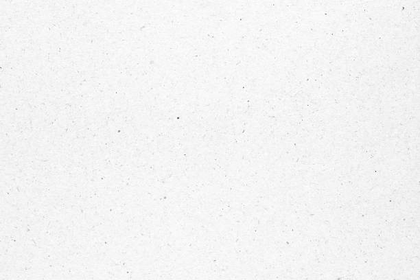 istock White paper or cardboard texture with black spot background. 1338796130