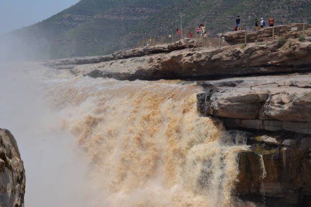 istock Hukou waterfall on the Yellow river, Shaanxi, China 1338799331