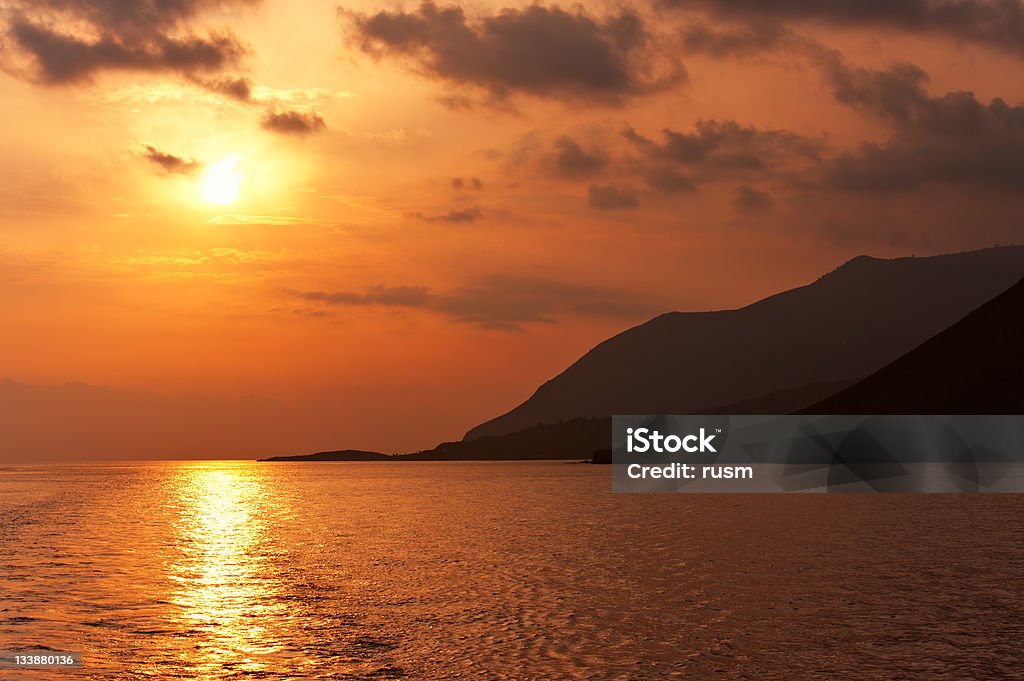 Sunset in Crete Sunset over the Mediterranean sea, Crete Back Lit Stock Photo