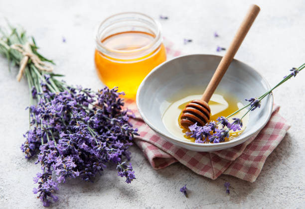 istock Jar with honey and fresh lavender flowers 1338802227