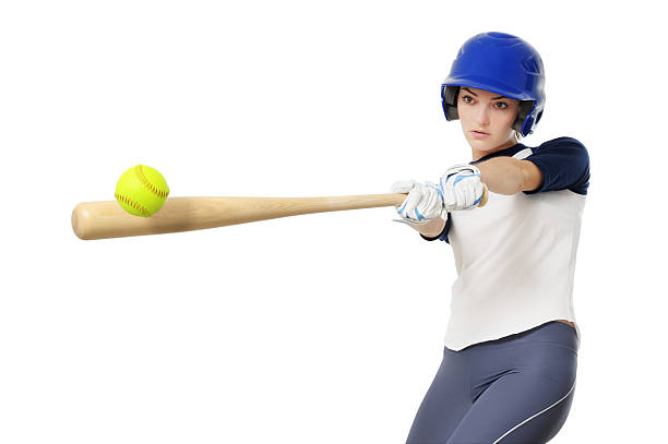 Young Woman Softball Baseball Player Isolated on White Background Young Woman Softball Baseball Player Isolated on White Background home run photos stock pictures, royalty-free photos & images