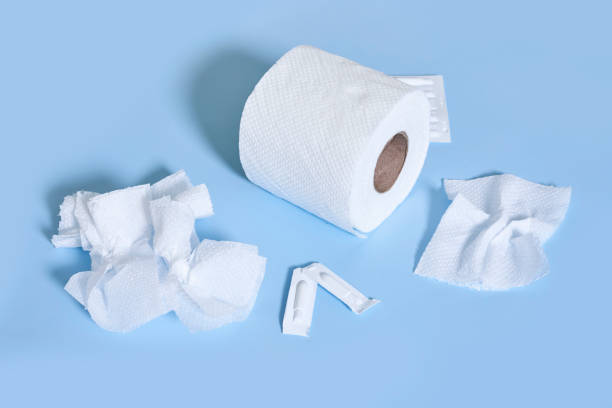 istock Toilet paper roll and hemorrhoidal suppositories 1338807307