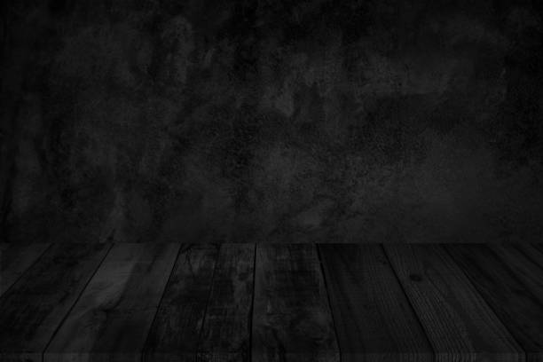 istock Empty wooden table top on black dark concrete wall background, Design wood counter white. Perspective for show space for your copy and branding. Can be used as product display montage. 1338807322