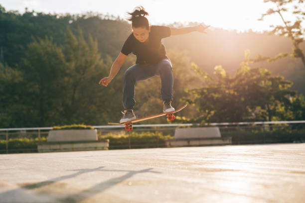 istock Skateboarder skateboarding outdoors in city 1338808981
