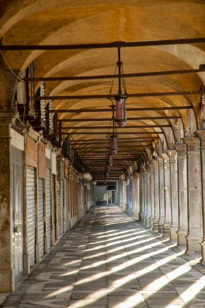 istock shadow at the colonnades at St. Mark's square in Venice 1338811803