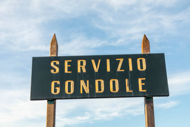 istock Servicio Gondole - engl: gondola service - signage at St. Mark's square in Venice 1338812249