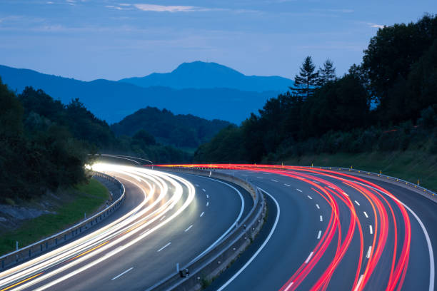 istock Car lights at dusk on the A8 highway, Donostia, Euskadi 1338817698