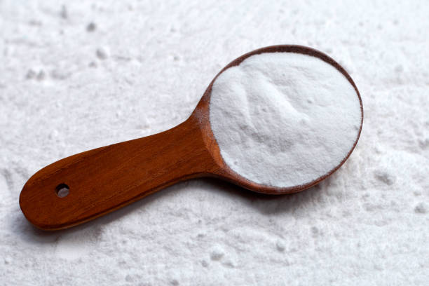 istock Baking soda with wooden spoon 1338819193