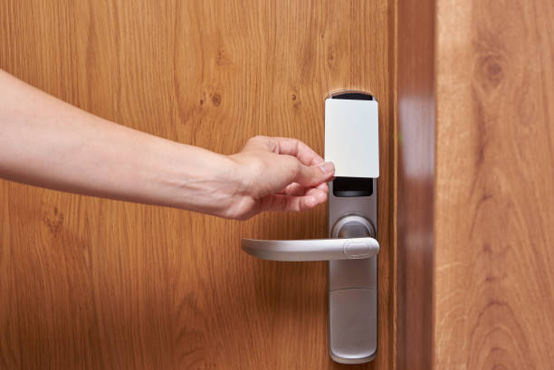 istock Hand open door digital lock with card key 1338819427