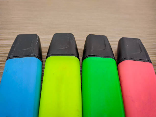 istock colorful pen markers on paper table 1338820423