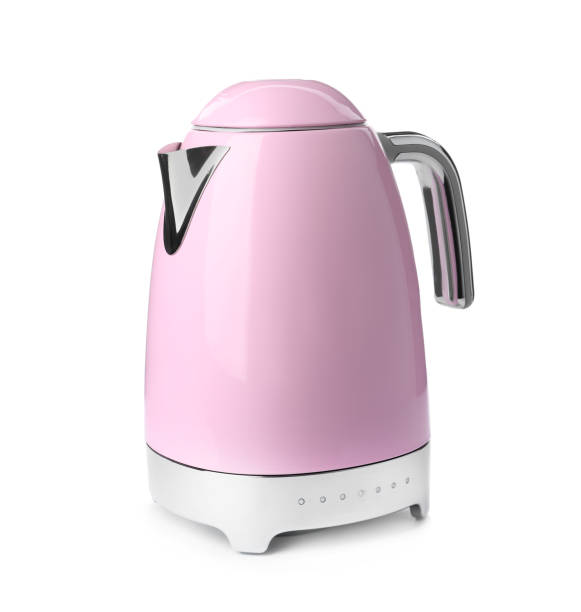 современный розовый электрический чайник с основанием, изолированным на белом - чайник стоковые фото и изображения
