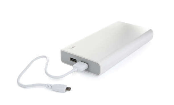 istock Modern external portable charger with cable isolated on white 1338822205