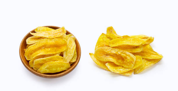 istock Banana slice chips on white background 1338822386