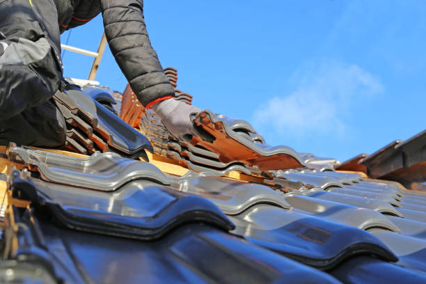 istock Roofing work, new covering of a tiled roof 1338823599